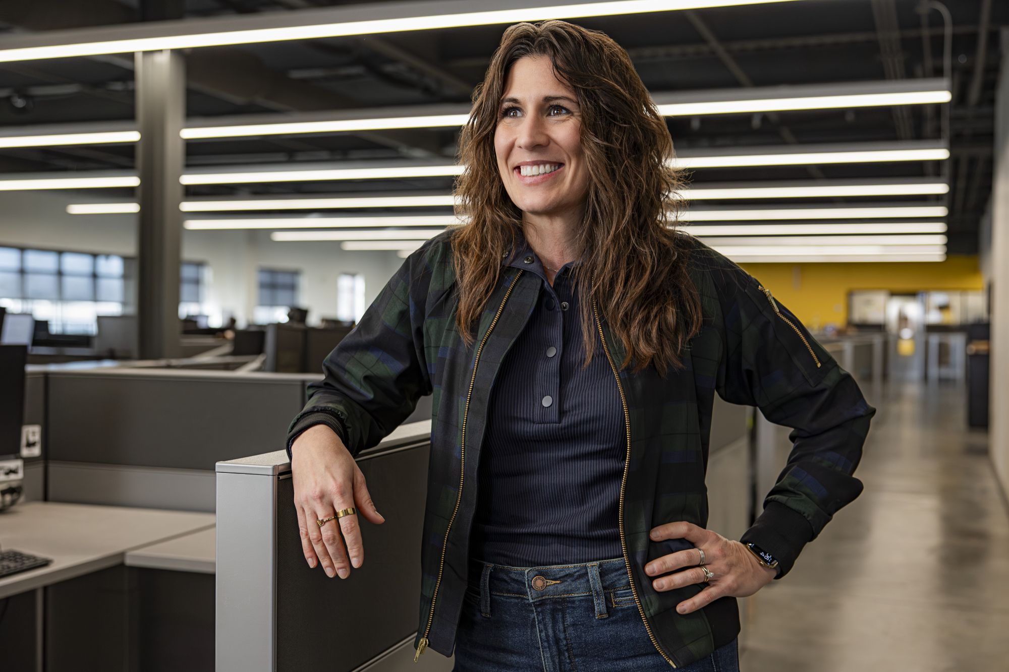 Brianne Schulte, VP of Strategy and Technology at Vermeer smiles for a photo within their office building.